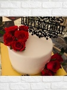 CAKE DECORATED WITH ROSE